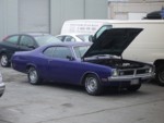 Highlight for Album: The Hot Rod Tuning shop installs a carb on Caitlin's 1971 Demon