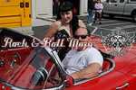 Mike Glickman gives this young lady a tour of his vette.