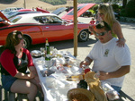 Sally, Ben and Joyce setting up the table